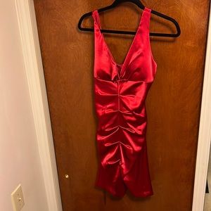 Red short cocktail dress size 6 fits like a 2. Worn once. Dry cleaned.